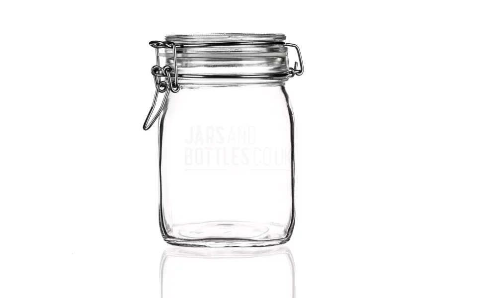 A clear glass Fido jar - a jar with a ninged lid in a the transparent background