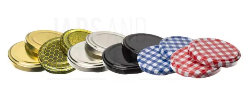 a set of twist off lids in various colours